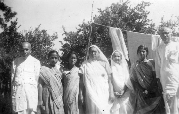Chhaganlal Gandhi and Prabhudas Gandhi (right) with a group of women, c. 1960.