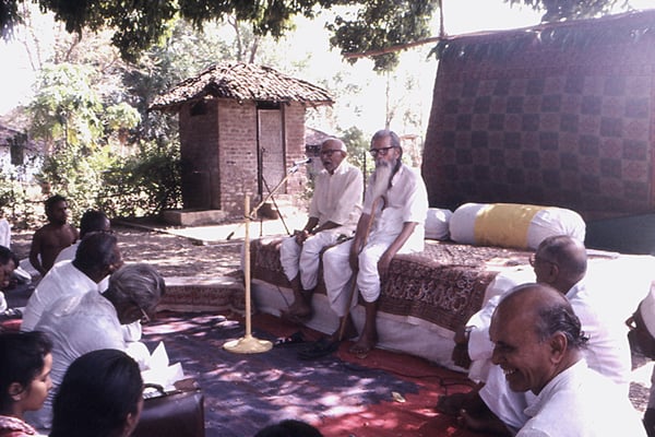 Prabhudas Gandhi and Shivaji Bhave (brother of Vinoba Bhave) speaking on the 50th anniversary of Sevagram Ashram, Wardha, 1986.