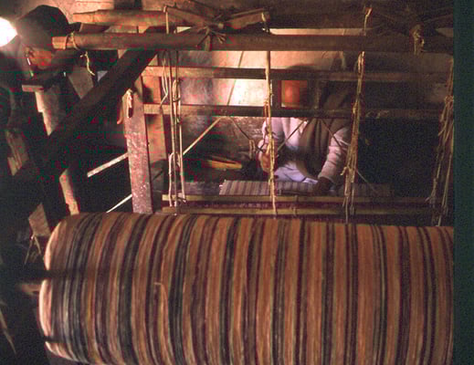 Prabhudas Gandhi (left) weaving at Asafpur, U.P., January 24, 1988.