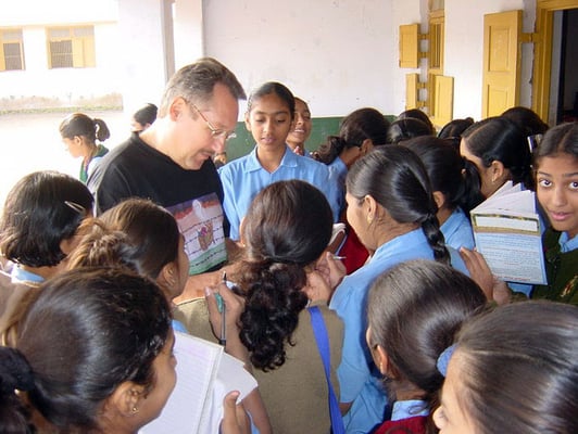 Peter Rühe interacting with students of the Gandhian school Kadvibhai Virani Kanya Vidyalay at Rajkot, 2004