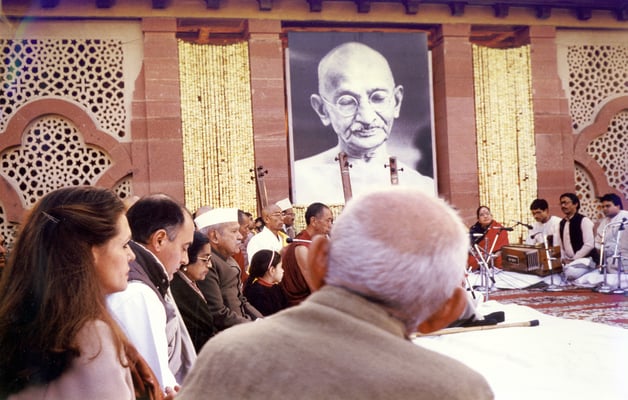 Prabhudas Gandhi (centre, from back) with Sonia and Rajiv Gandhi (both left) during prayer at Birla House, New Delhi, on the occassion of Mahatma Gandhi's 40th death anniversary, January 26, 1988.