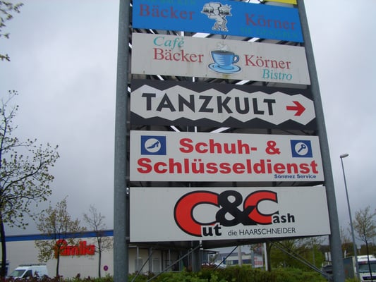 Lichtwerbung für Schuhreparatur