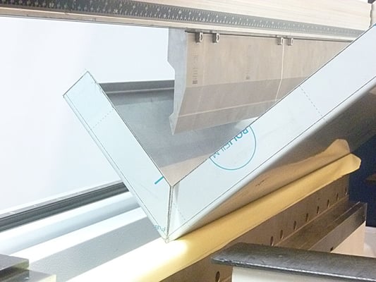 Pliage bâti défournement en ino 304L protégé 1 face en 1,5 mm