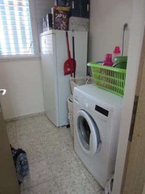 Buanderie avec lave linge