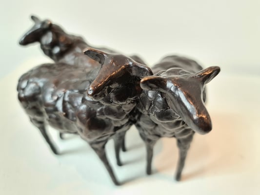 3 bronze sheep