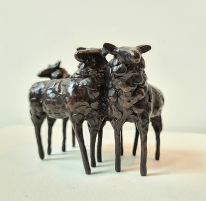 3 bronze sheep