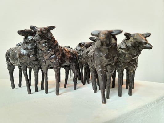 16 bronze sheep