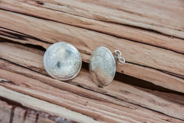 Fünfzig Rappen Ohrstecker 250.-