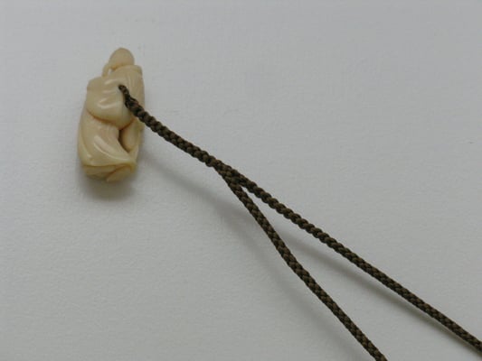 紐穴から組み始め