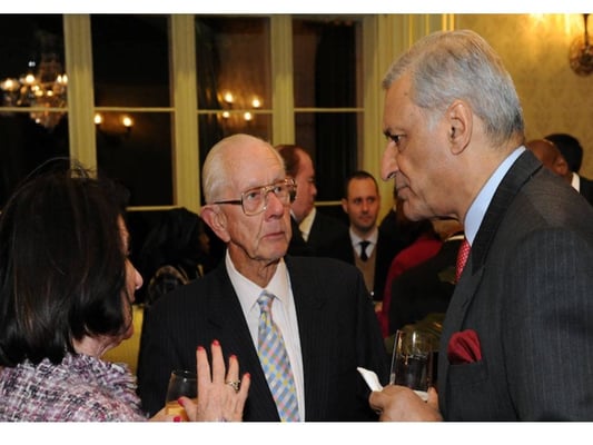 Frank Garland (left) discusses a point of view with Mr Kamalesh Sharma Secretary-General of the Commonwealth