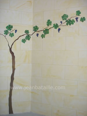 détail d'un décor en fausse pierre avec végétation