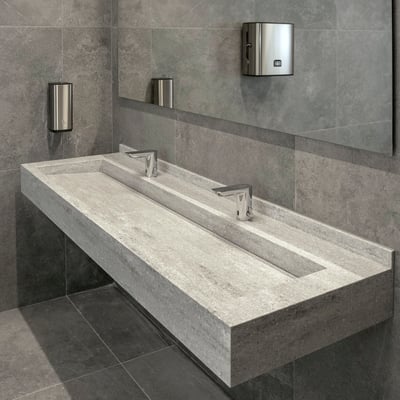 Hanging double washbasin from acrylic solid surface at a business centre / fabricator: Gforma