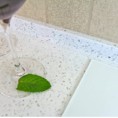 Acrylic stone countertop with a low curb / fabricator: Gforma