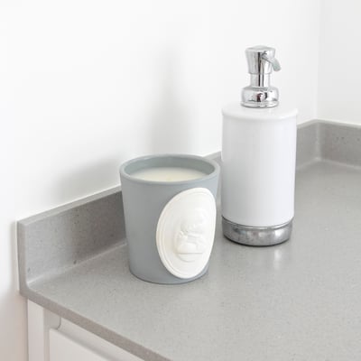 Grey acrylic stone vanity top with a curb / fabricator: Gforma