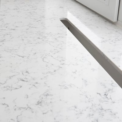 White and grey windowsill continuing into bar from Silestone Lyra engineered stone