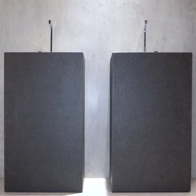 Freestanding square washbasins, walls and floor at a business centre, all fabricated in Neolith sintered stone