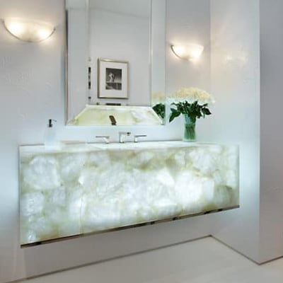 Hanging bedroom console from translucent white agate glowing from within because of installed LED lights