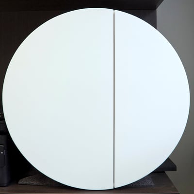 White round cabinet fabricated from Corian Glacier White / fabricator - Gforma