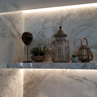 Decorative granite wall behind the bar