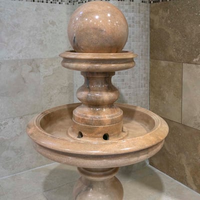 Marble fountain of cream colour 
