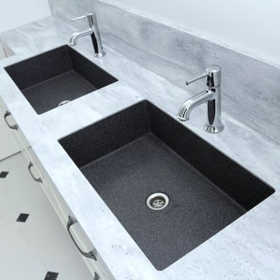Grey bathroom vanity with two black integrated sinks fabricated from Corian solid surface materials / fabricator: Gforma