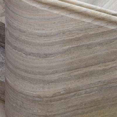 Travertine railings in the staircase