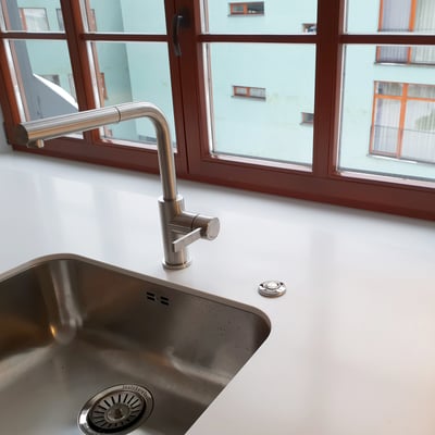 Acrylic solid surface windowsill functioning as a worktop with undermount steel sink / fabricator - Gforma