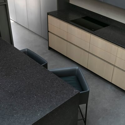 Kitchen countertop and dining table fabricated from black Neolith sintered stone