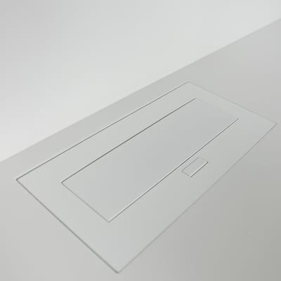 Socket block integrated into solid surface countertop at a medical clinic