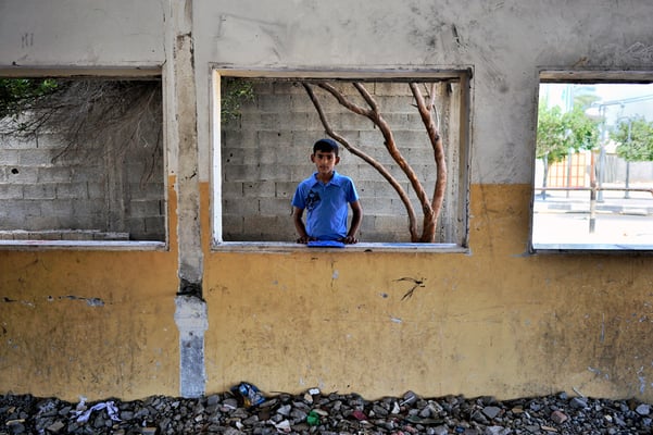 Fighting child labor after the war in Gaza - a shelled classroom -  Palestine © François Struzik - simply human 2015