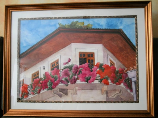 “Florecer de Veraneras a cada lado del Balcón”  ACUARELA HORIZONTAL ENMARCADA   Tamaño:  27.5 plgs ancho por 19.5 plgs de alto, 70 cm de ancho x 50 cm de alto. (Sin marco).  Con enmarcado mide: 86 cm (33.75 plgs)  ancho x 66cm(26plgs) Precio:$350.00USD