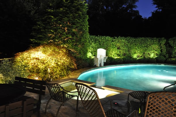 Landscape lighting around the pool, allows one to enjoy their own personal "resort-like" oasis.