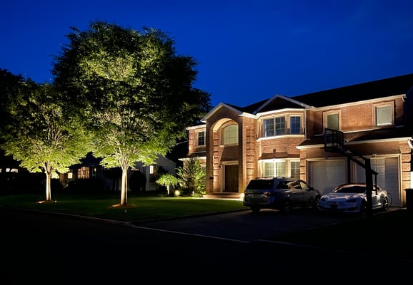 Another stately home with a brick facade, basking in the warm glow while showing-off its stone textures and shadows. Paramus, NJ