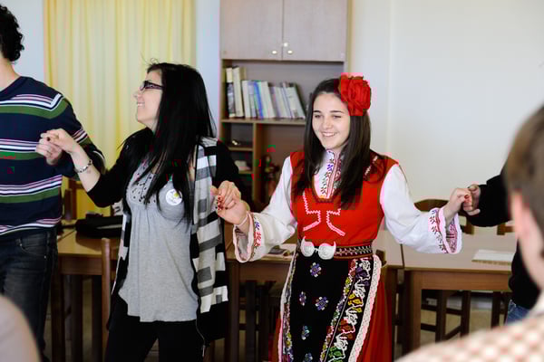 Bulgarians teaching others Bulgarian traditional dances
