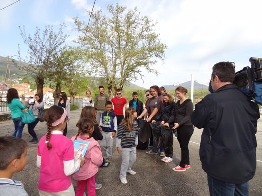 Children of school of Parakalamos giving us paper for paper recycling