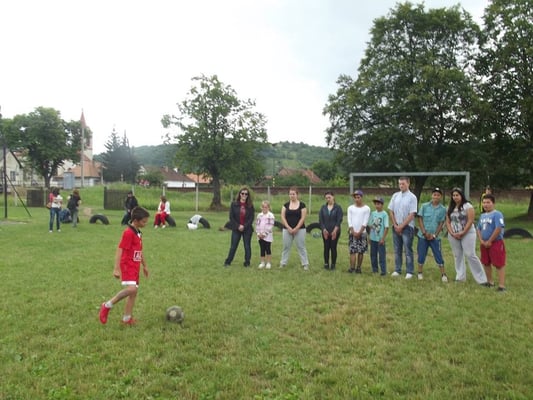 Playing football with kids