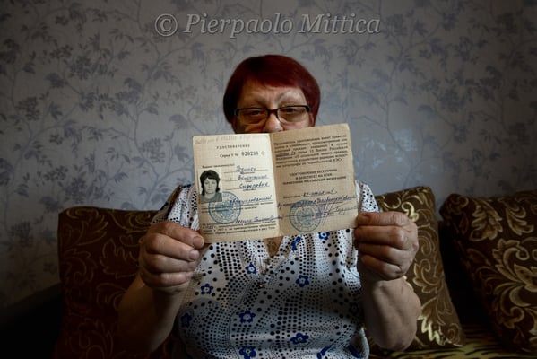 Valentina Rodina, Milana's grandmother while showing her certificate of radiation victim. Kysthym
