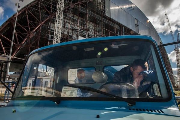Workers involved in the construction of the new confinement. 2,000 workers are building the new sarcophagus to bury the reactor number 4. The new safe confinement is 110 meters high, 164 meters large and 257 meters long. 