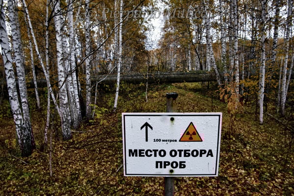 The sign warns: detection point for the contamination. Road to Lake Karachay, Novogorny
