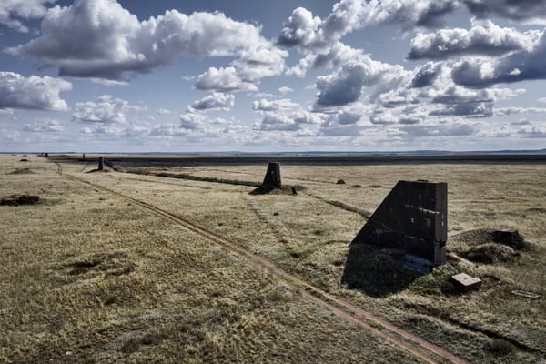 Buildings inside the polygon that were used to test the atomic explosions. Polygon, Kazakhstan Inside the polygon huge buildings were erected to test the effects of atomic bombs and to protect cameras to document the explosions