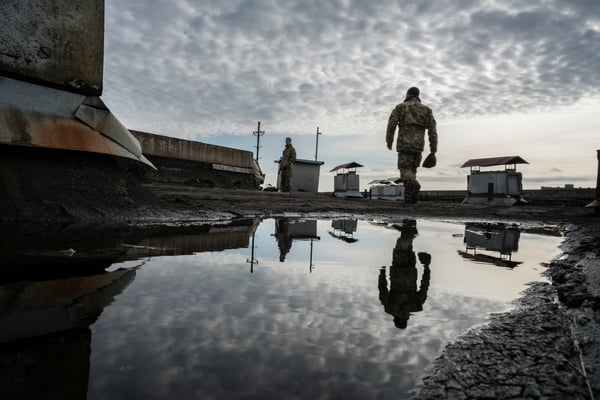 Maxim and other stalkers in a roof of a building in the ghost town of Pripyat