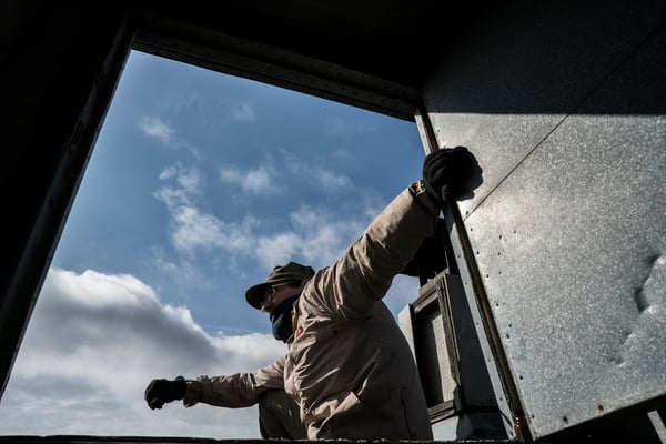 Sasha on the roof of a building in the ghost town of Pripyat