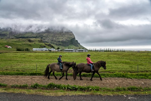 Iceland. Children depart for a horseback trip from the Skakalot Hotel, a well-known boutique hotel in the south of the country. Horseback tours around some of Iceland’s splendid landscapes are among the preferred activities for tourists.
