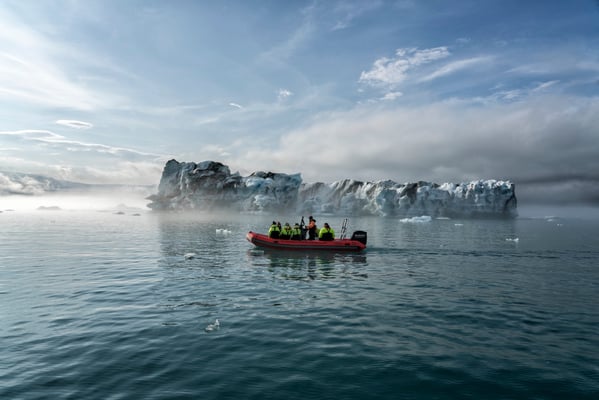 Iceland. Jökulsárlón Glacier Lagoon. Tourists board a dinghy to visit the glacier. Glacier Lagoon is located in the Vatnajökull national park in the south of Iceland, an area popular with tourists and one of the island’s best-known attractions.