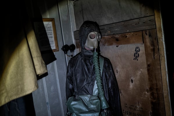 A dummy with equipment to deal with nuclear contamination
