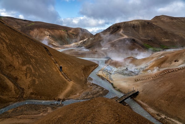 Iceland. A tourist visits the Hveradalir geothermal complex, a wonderland of geothermal vents, boiling mud pools and rainbow-coloured hot springs, located in Kerlingarfjöll, a mountain range in Iceland’s central highlands.