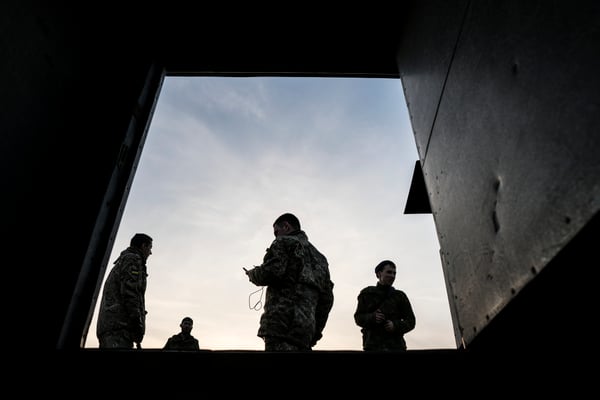 Stalkers on the roof of a building in the ghost town of Pripyat.