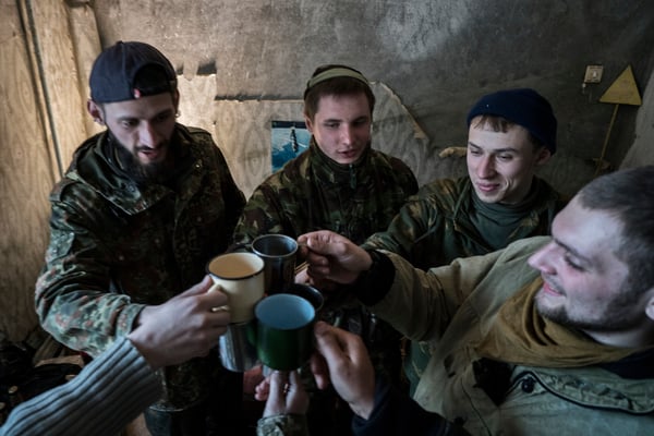 Vodka party for stalkers in Jimmy’s apartment in Pripyat.