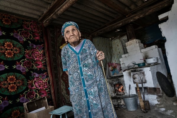 Duisenbaeva Sabira, 82 years old in her house in Bodene village. Duisenbaeva Sabira, has ten children, is one of the direct witnesses of the atomic explosions carried out in the air. She lives in the contaminated village of Bodene