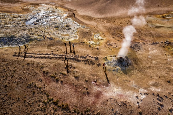 Iceland. Tourists visit the geothermal areas near the lava fields of Leirhnjukur, situated in the region of Mývatn in the north of the island.